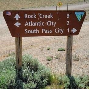 Brown BLM sign: Rock Creek 9, Atlantic City 2, South Pass City 1